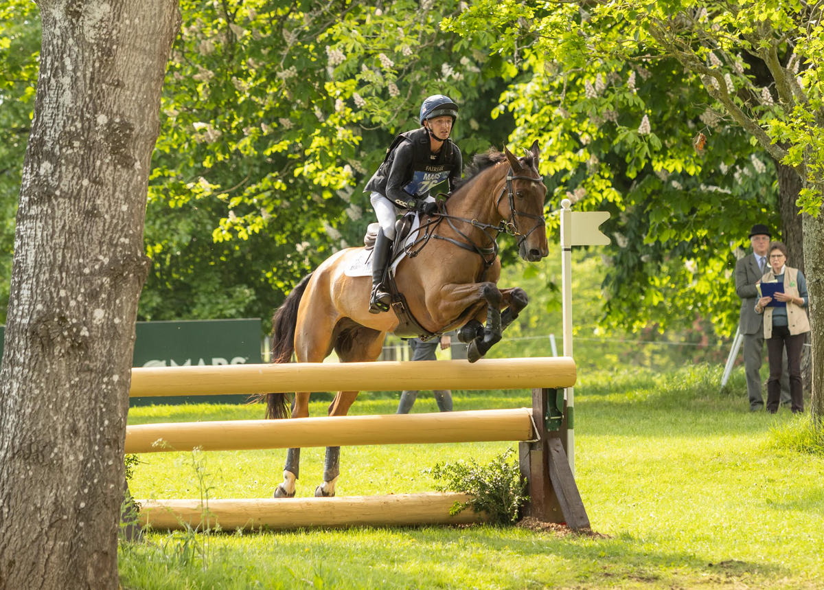 Tom Jackson riding cross country in a black Point Two Pro-Air vest.