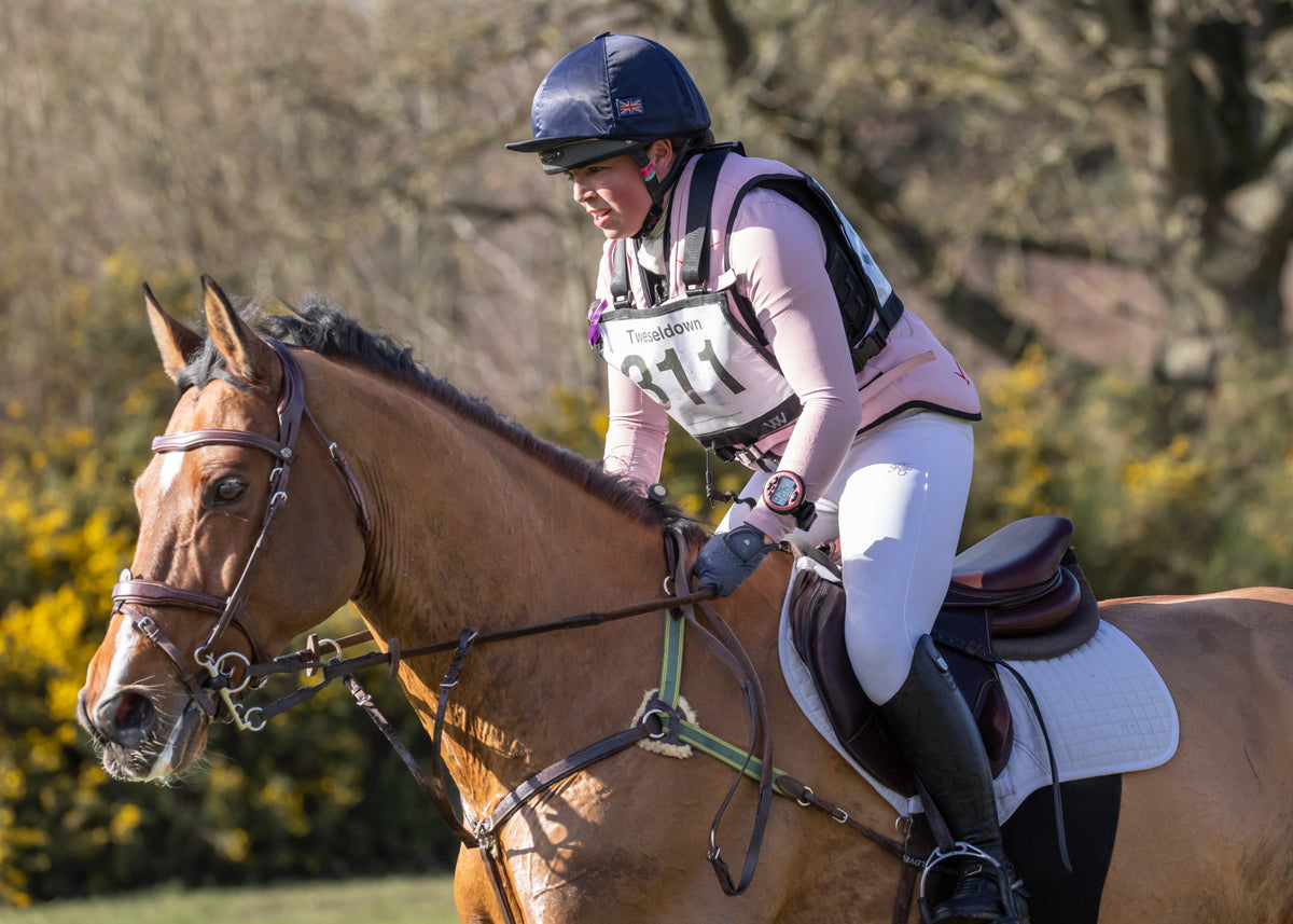Georgia Bartlett riding cross country in her pink Point Two Pro-Air Vest.